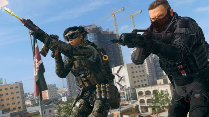 call of duty warzone player duo on roof with heavy weapons