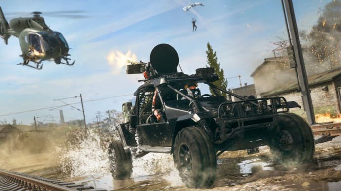 Call of Duty Warzone Urzikstan, the new coyote all-terrain vehicle is followed along the railway tracks by a helicopter.
