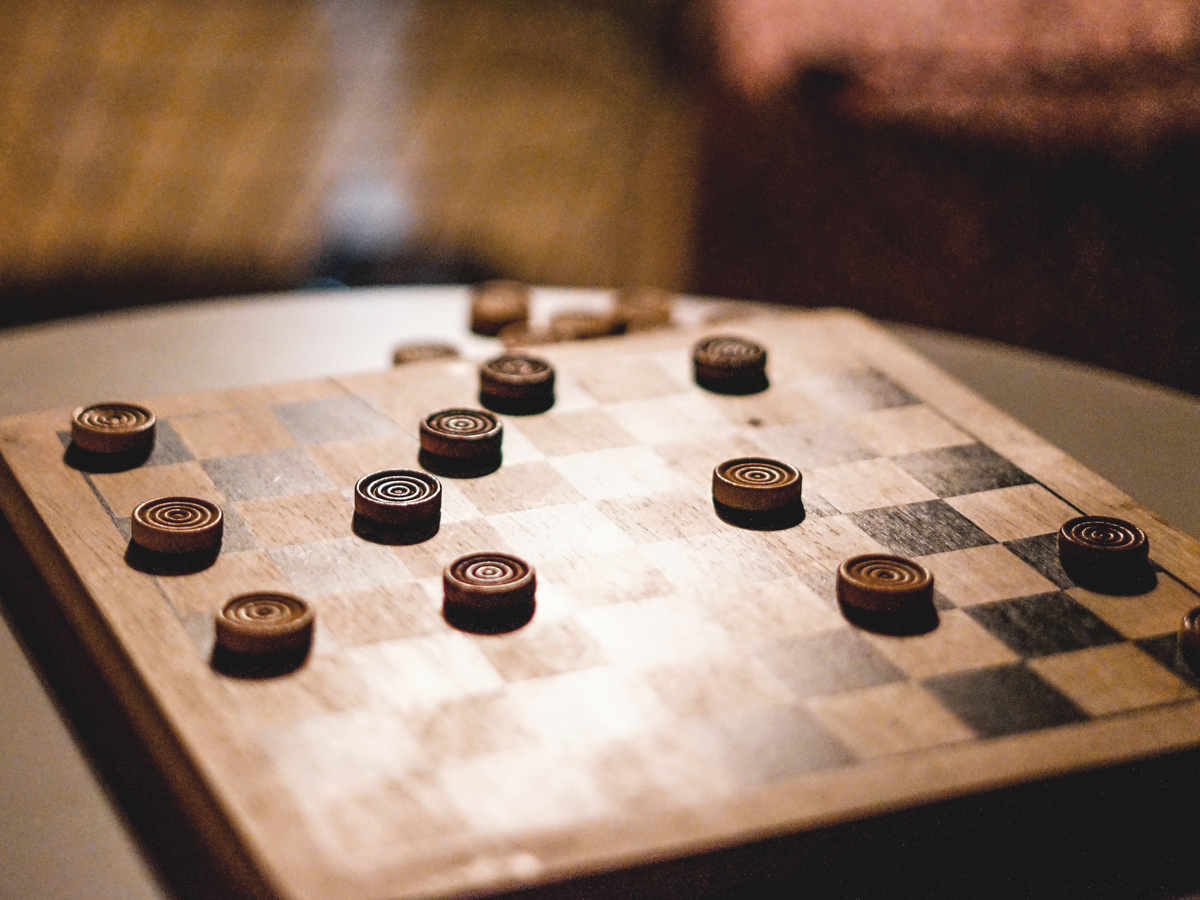 Playing Checkers Game