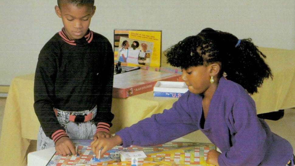 Children playing the game Black Explorers
