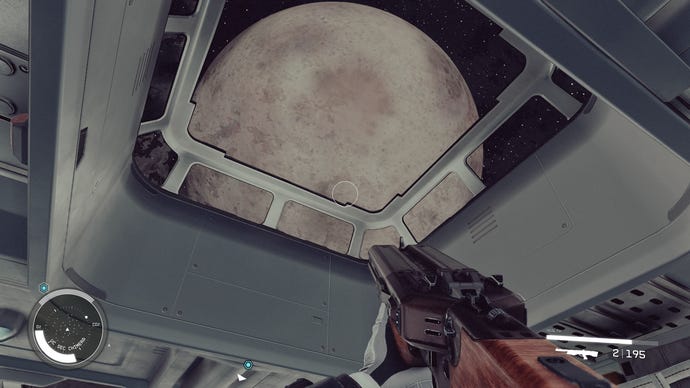 A view through a spaceship skylight at a nearby planet in Starfield.