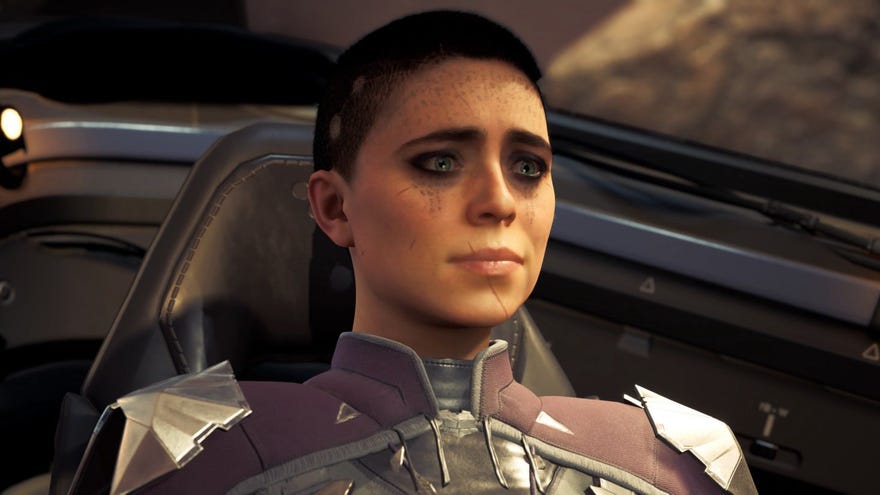 A close up of Nara, the protagonist from Chorus sitting in the cockpit of a space ship. She's a young white woman with a scar running across her lip and chin, dark eyeliner, tattoos of script across her forehead, and a short military-style haircut