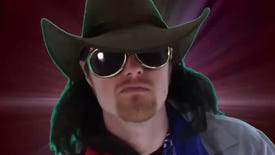 A long-haired man wearing a stetson hat and a pair of aviator sunglasses stares menacingly into the camera