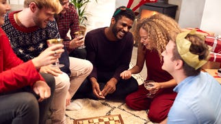 People playing board games at Christmas