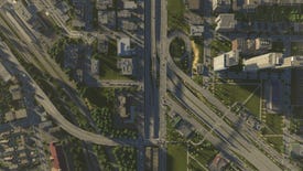 An overhead view of a complex road interchange in Cities: Skylines 2
