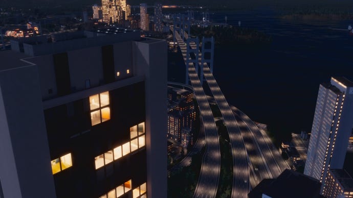 A night time urban scene in Cities: Skylines 2