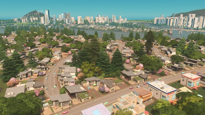 Eine wunderschöne kurvenreiche Straße mit sauber aneinandergereihten Häusern in einem Cities: Skylines-Screenshot.