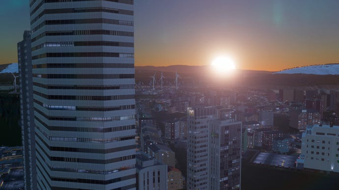 The sun rises over a slumbering city in Cities: Skylines 2.