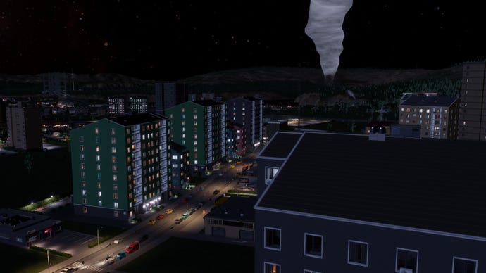 A city at night, illuminated by streetlights in Cities: Skylines 2.