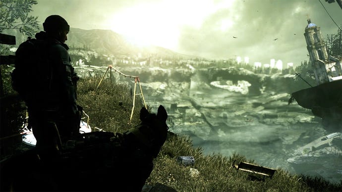 A man and his dog looked out onto a large crater in Call Of Duty: Ghosts