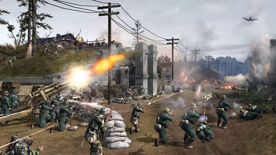 An urban battlefield with hundreds of soldiers running across the screen in Company Of Heroes 2