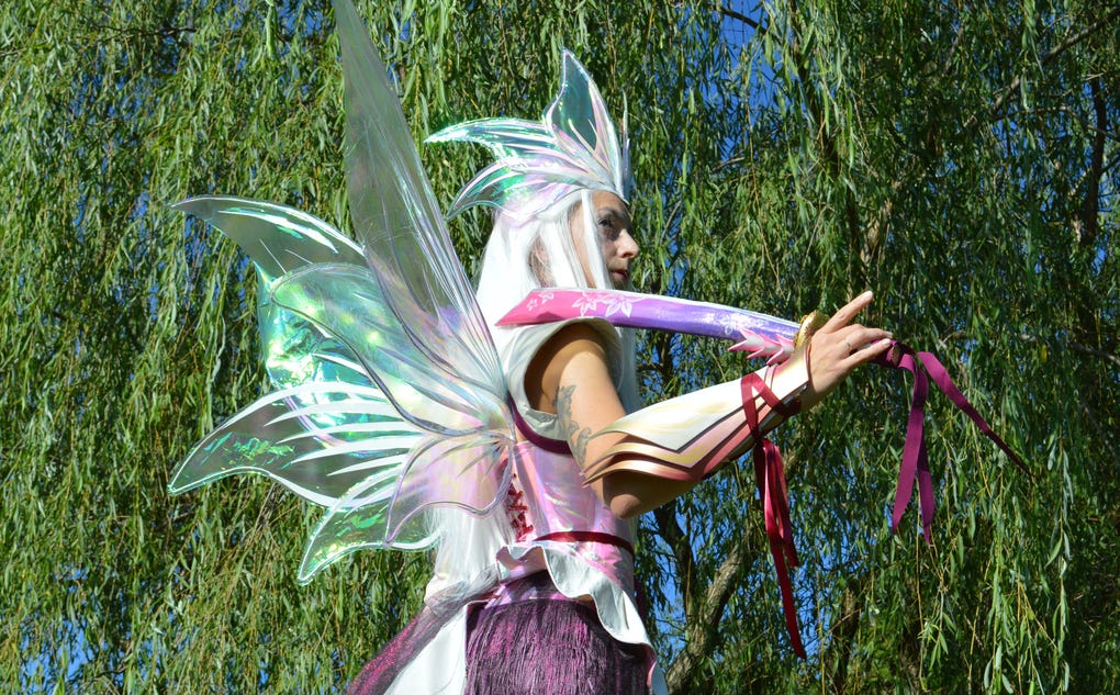 Mizutsune OC by PlexiCosplay using standard fairy wing craftsmanship with wires, cellophane, and brillo board