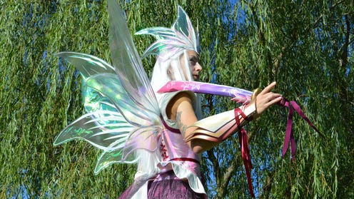 Mizutsune OC by PlexiCosplay using standard fairy wing craftsmanship with wires, cellophane, and brillo board