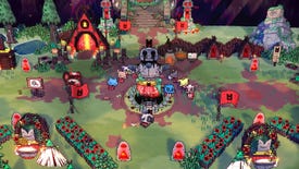 A village surrounding a statue of a lamb with bleeding eyes in a Cult of the Lamb screenshot.