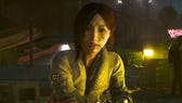 Cyberpunk 2077 best relic skills: A woman in a well-tailored silver jacket, with shoulder-length hair, is dimly illuminated by dirty yellow light. She stares into the camera while speaking with the player character