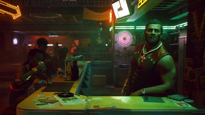 The bartender in Cyberpunk 2077 looks at the camera in a futuristic bar.
