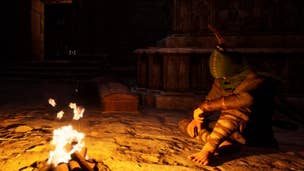 Dark and Darker solo classes and tips: A man wearing a cloth hood and brown shirt is sitting on a dirt floor in front of a campfire, with his left leg bent and his left elbow resting on his knee