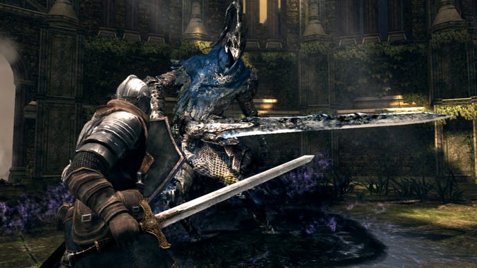 A knight readies their shield as they fight an even bigger knight in Dark Souls: Prepare To Die Edition