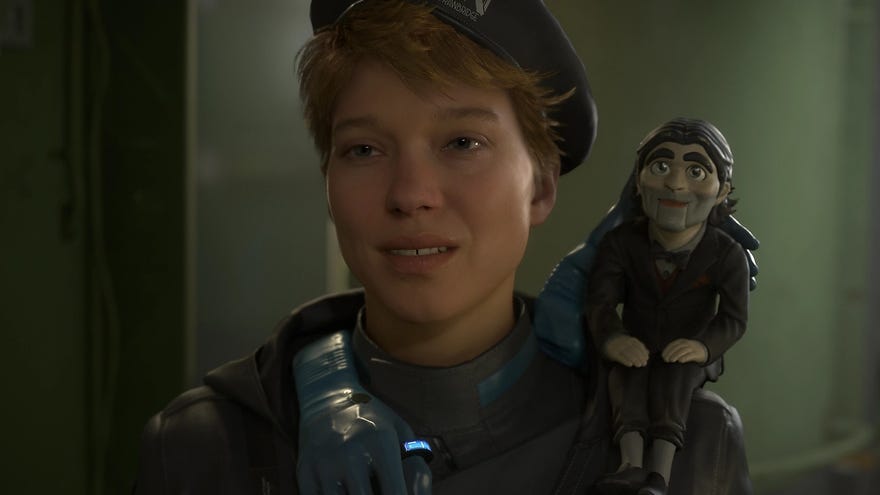 A woman smiles at the camera with a wooden puppet on her shoulder in Death Stranding 2: On The Beach