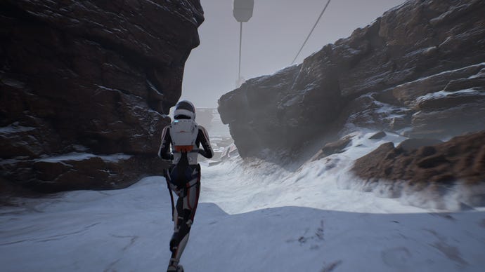 An astronaut runs through a snowy ravine in Deliver Us Mars