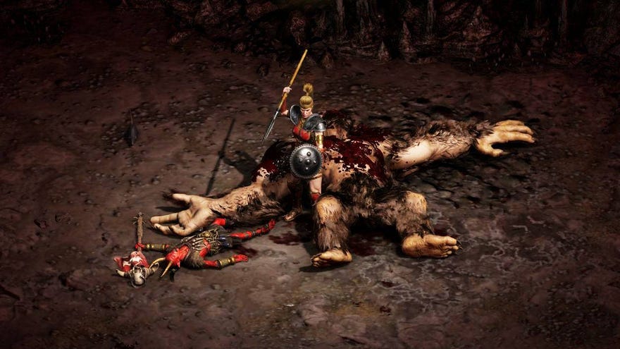 The Amazon player character from Diablo II: Resurrected stands, javelin razed to strike, on top of the corpse of a gargantuan beast. The image has been brightened slightly to make it more visible