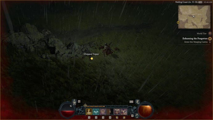 A character collects a Diablo 4 Gem as a random drop.