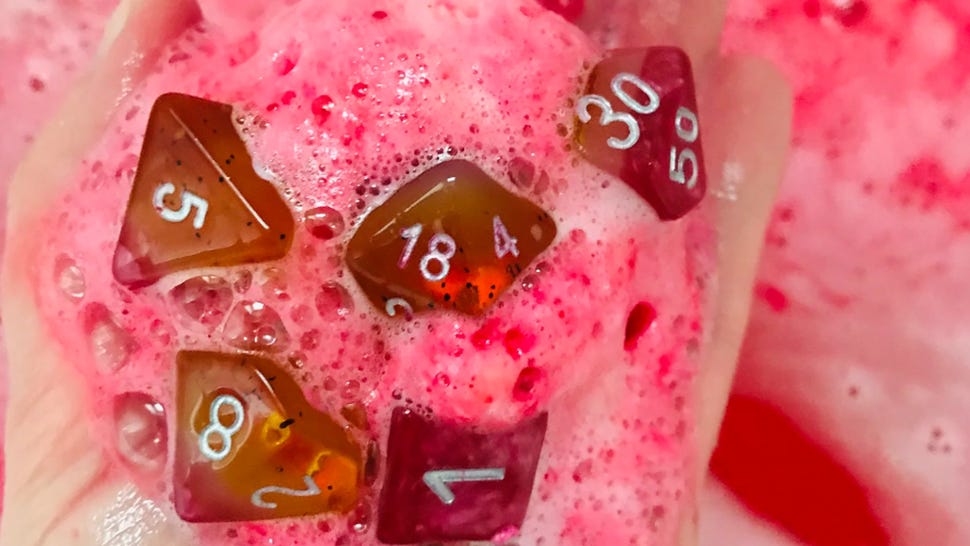 An image of a dice-filled bath bomb from Geeky Clean.