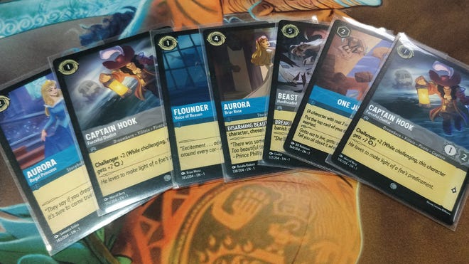 An image of cards from Disney Lorcana.