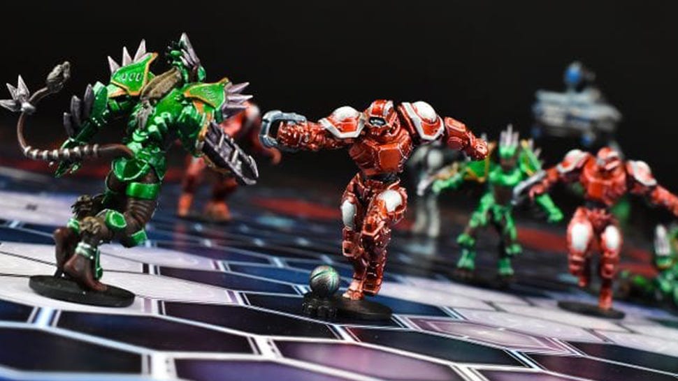 Dreadball miniatures in play on game board