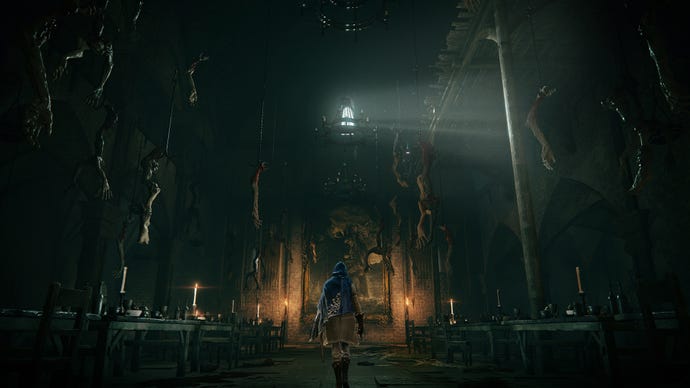 A figure walks down a dark hall with severed limbs hanging from ceiling hooks in an Elden Ring screenshot.