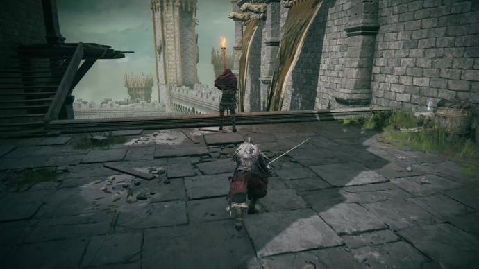 The player, crouched, approaches an enemy from behind in Elden Ring.
