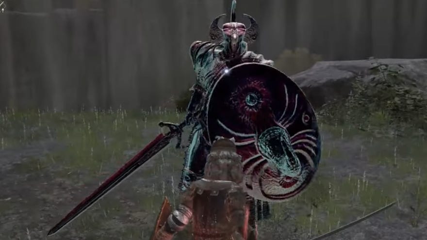 The Crucible Knight, a boss in Elden Ring, bears down upon the player holding its greatsword and shield.