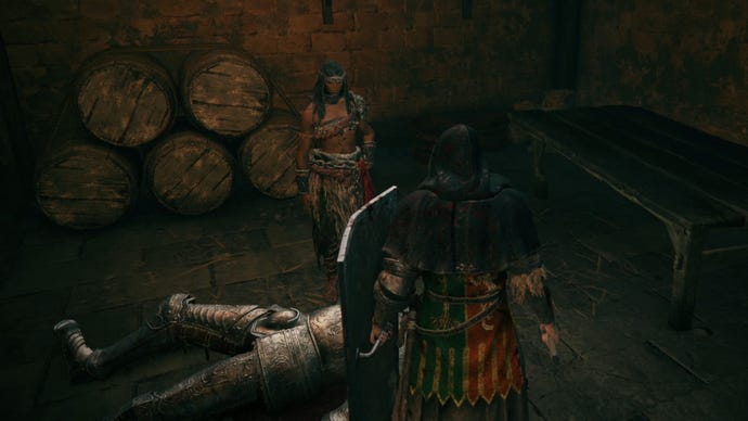 The player speaks to the warrior Nepheli Roux in Stormveil Castle in Elden Ring.