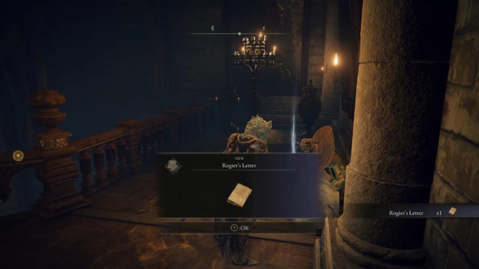 The player takes a letter from Rogier's corpse in Elden Ring.