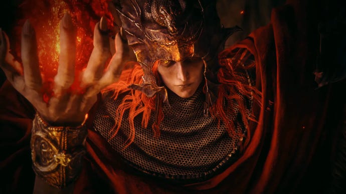 Mesmer der Pfähler hebt eine Hand und umfasst einen leuchtend roten Gegenstand im Elden Ring DLC ​​Shadow of the Erdtree