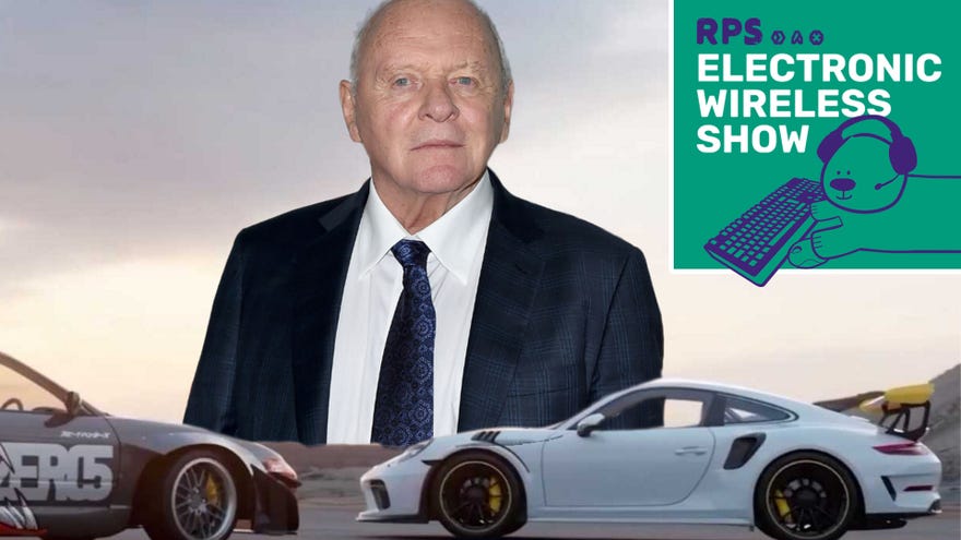 Sir Anthony Hopkins looks on as muscle cars drive in front of him