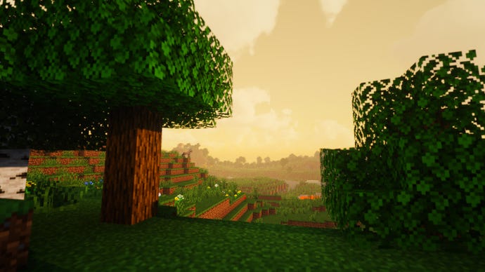 Two trees in a Minecraft landscape.