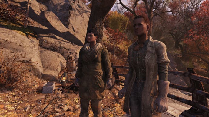 Fallout 76 State of the Game - two NPCs stand waiting amongst autumn leaves, outside the exit of vault 76