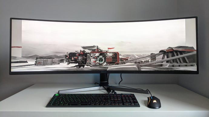 A photo of an ultrawide gaming monitor running FAR: Lone Sails