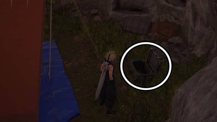 A circle highlights an open reward chest that Cloud is looking at from behind an orange tent.