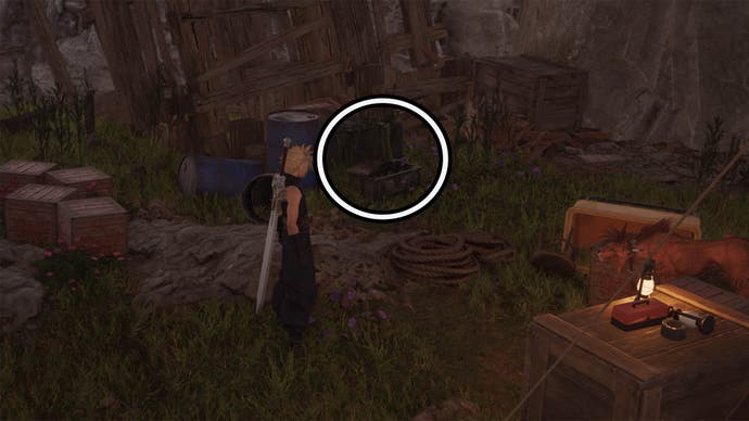 A circle highlights an open reward chest under a random wooden structure, it's hidden among other crates as Cloud looks at it.