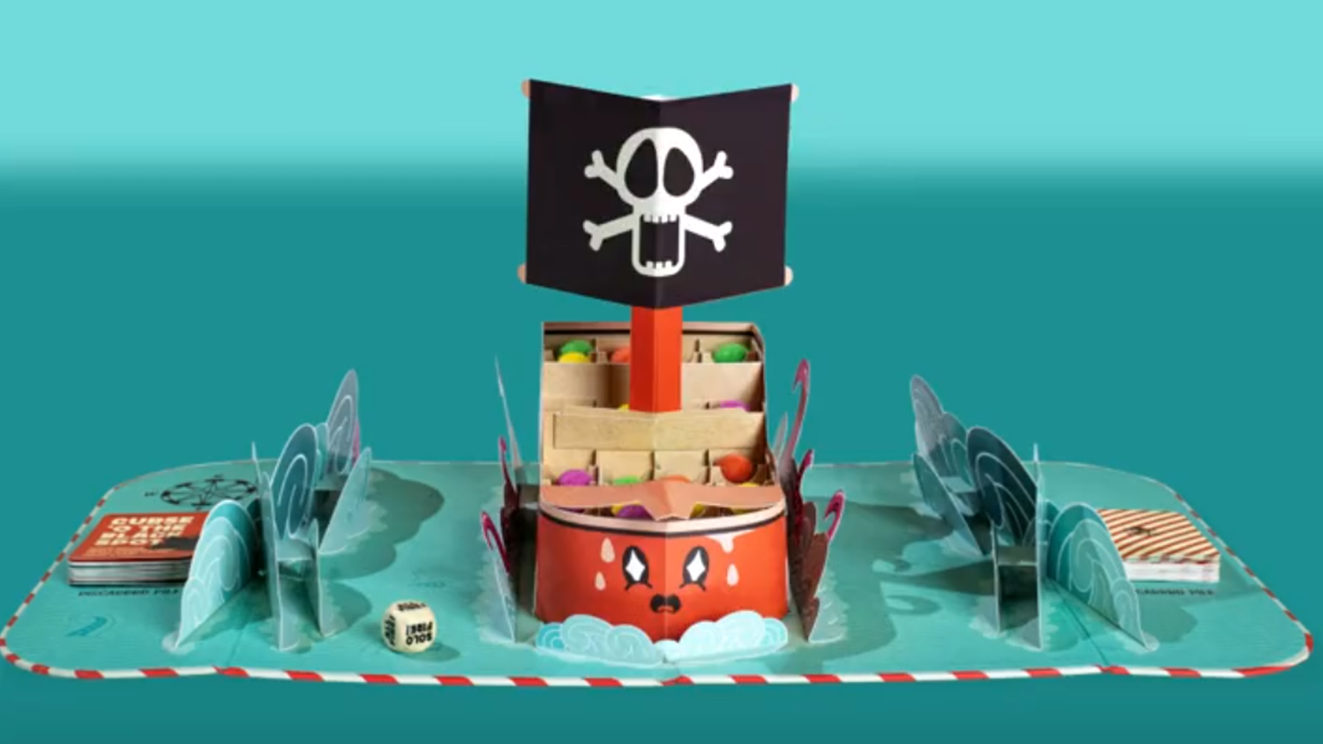 Pirate board game sees players shooting cannonballs into a pop-up ship Dicebreaker