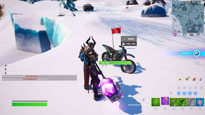 Fortnite dirt bike lcoations: An animated character in spiky black armor stands in a snowy field looking at a motorcycle