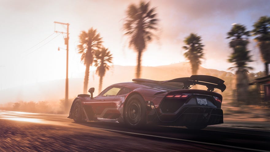 A car driving into the sunset in Forza Horizon 5