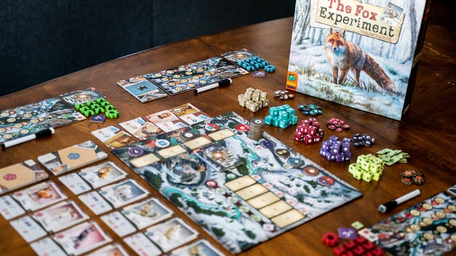An image of the board, components and box for The Fox Experiment.
