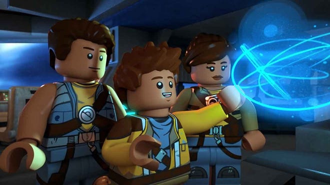 Image from Star wars show featuring LEGO figures looking at a hologram