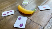 A squeaky banana and a deck of cards are all you need for a ridiculous, raucous time in party game Fruit Punch