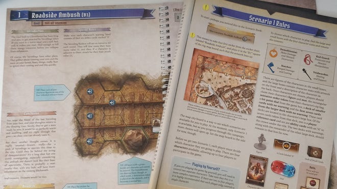 Image of the how to play and scenario book from Gloomhaven: Jaws of the Lion.