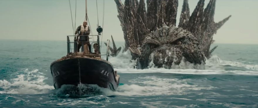 Still image of Godzilla coming after a boat