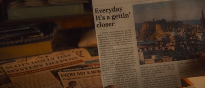 A still iamge of a newspaper that reads "Everyday its a gettin closer"